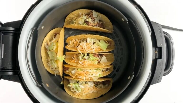 Taco Shells in The Air Fryer Filled with Lettuce, Cheese, and Meat, Ready for Serving