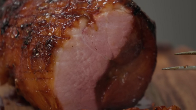 Sliced butt portion ham ready for storage after gentle reheating